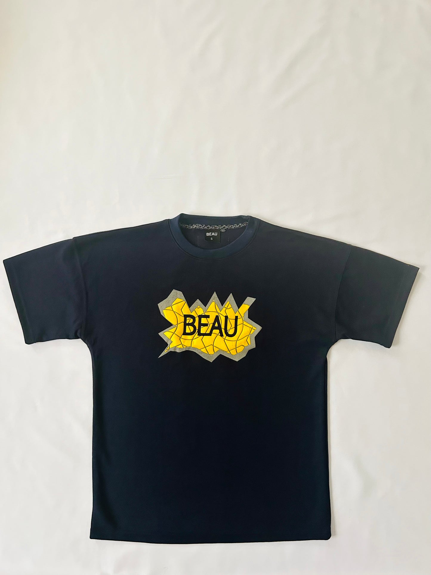 “UNRAVEL” T-Shirt